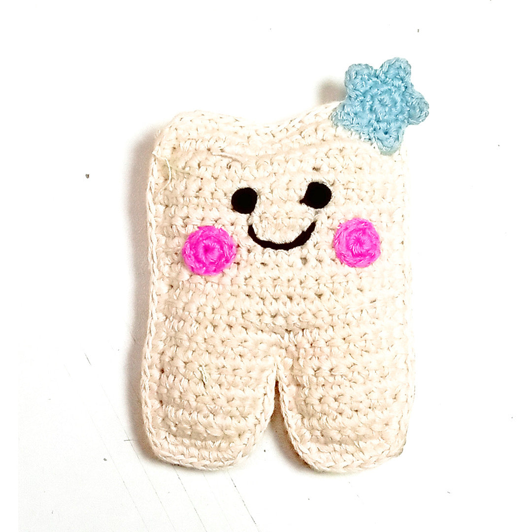 Hand crocheted plush tooth with smiley face.