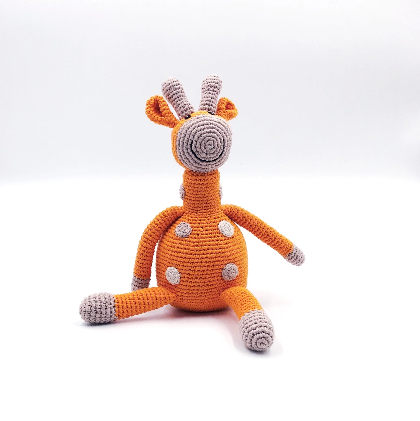 Organic cotton orange giraffe plush doll.