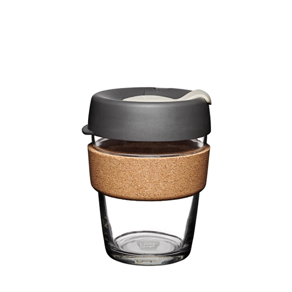 Medium 12 ounce glass keep cup with black and white lid and 100 percent recovered cork band. 