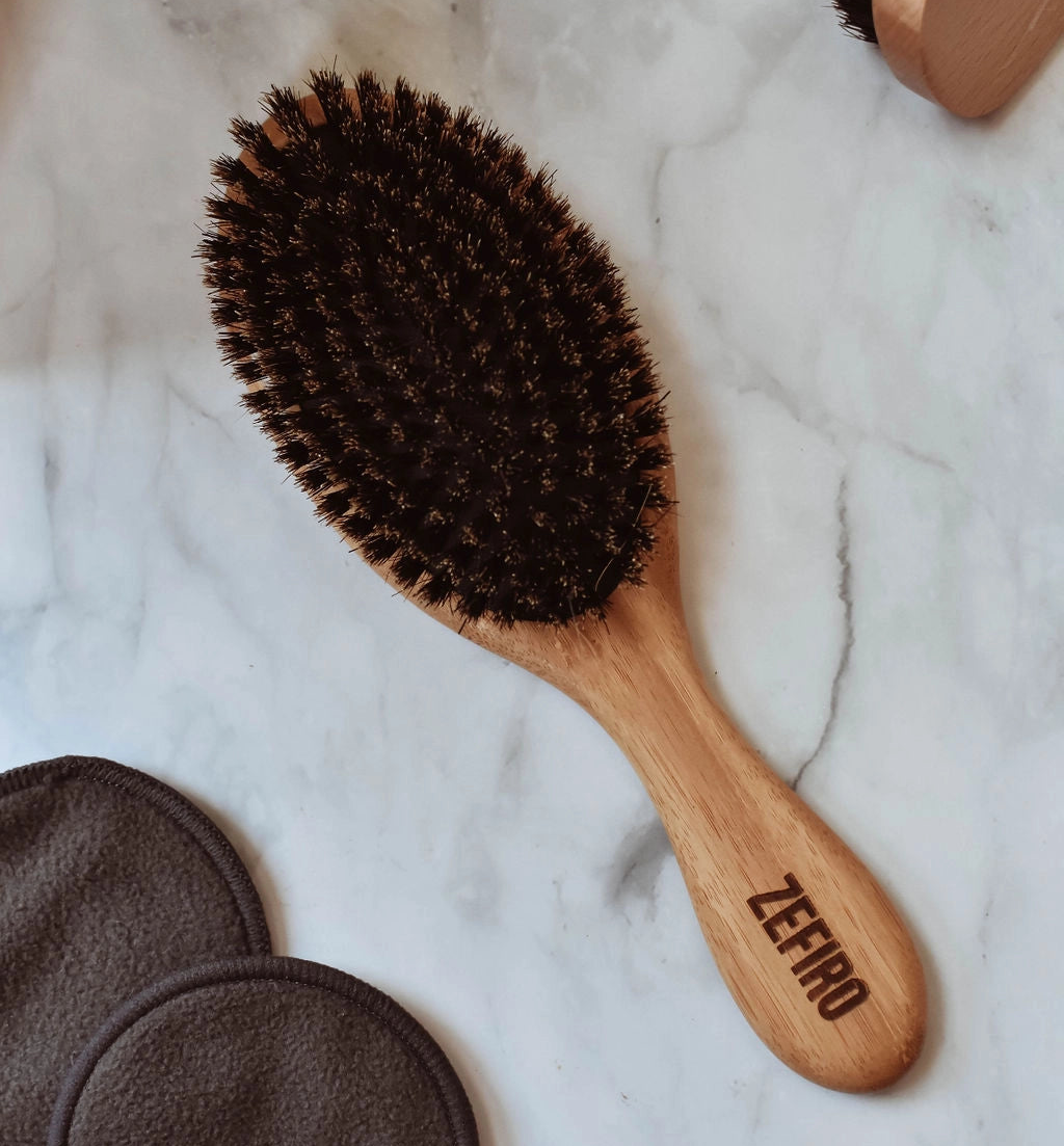 Bamboo hairbrush with boar hair bristles. 