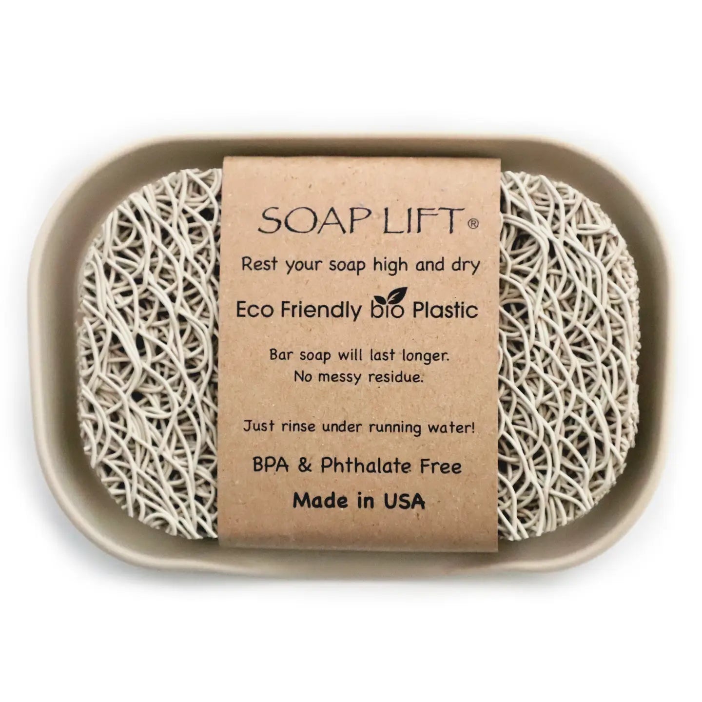 Tan bio plastic soap dish with a soap lift placed on top fitting into the recessed area.