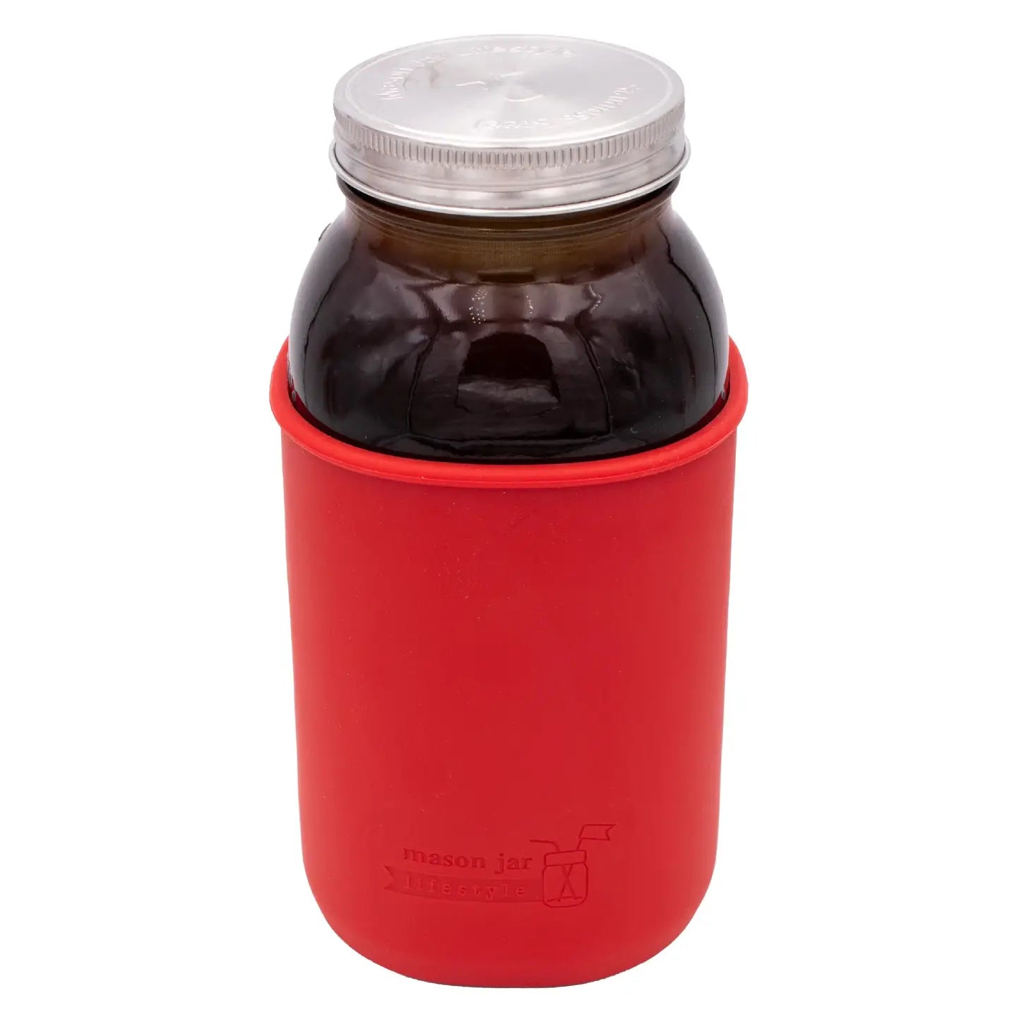Red koozie with a mason jar filled with dark liquid on a white background