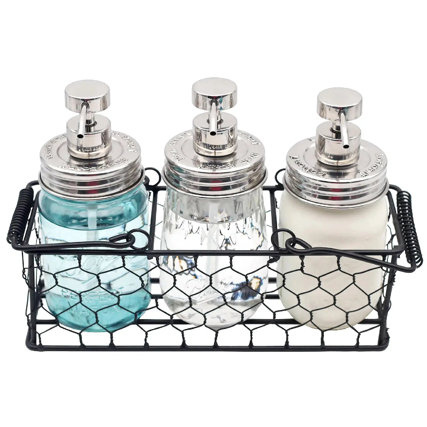 Three glass bottles with metal pumps in a wire basket on a white background