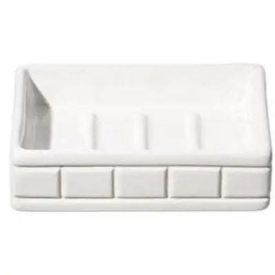 Rectangular white ceramic dish with textured surface on a white background