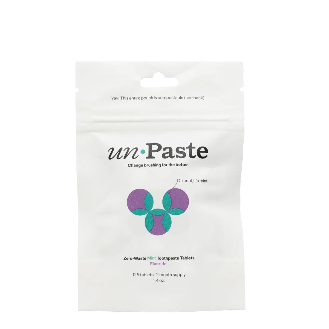Packaging of un Paste zero-waste mint toothpaste tablets on a white background