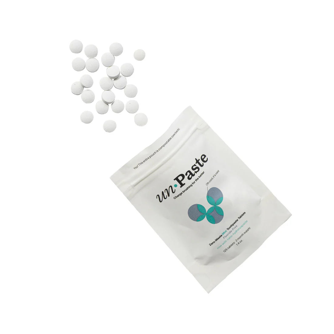 Unpaste packet with tooth tabs spilling out. 