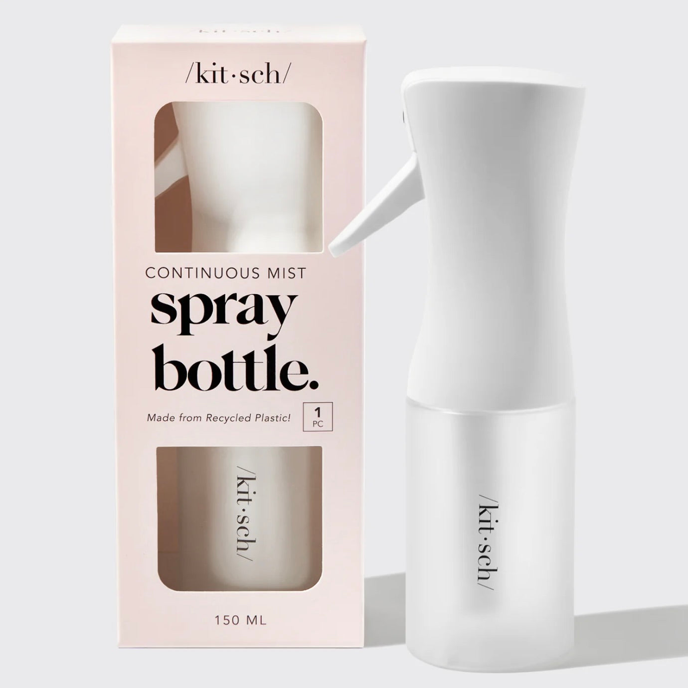 White continuous mist spray bottle with pink packaging labeled 'kit-sch' on a light gray background.