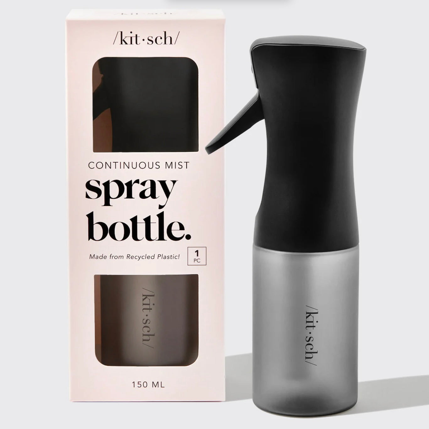 Black and translucent gray continuous mist spray bottle with packaging on a white background.